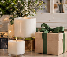 Illustrative candles and a wrapped gift